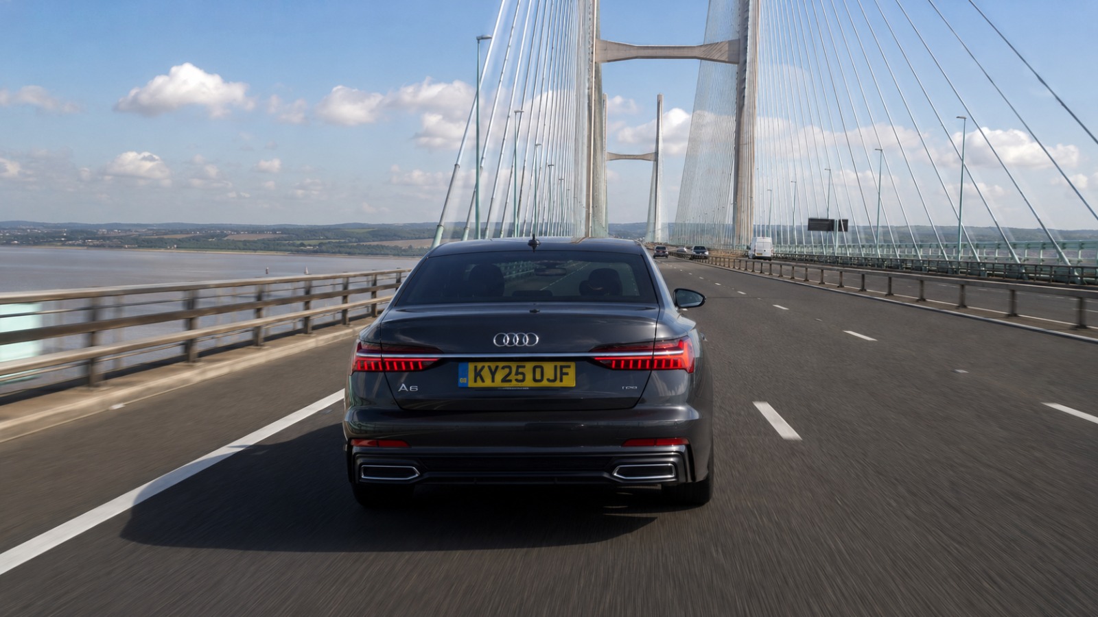 Taxi crossing the toll-free Prince of Wales Bridge on the M4 from Cardiff towards Heathrow