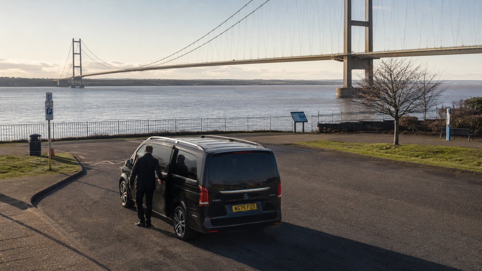 8-seat minibus at Humber Bridge viewpoint with Hull group for Manchester Airport transfer