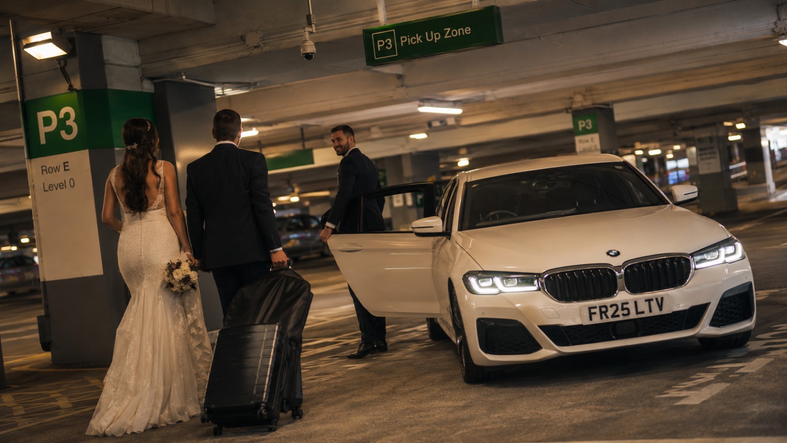 Wedding couple arriving at Manchester Airport Terminal 2 P3 late night for Preston return transfer